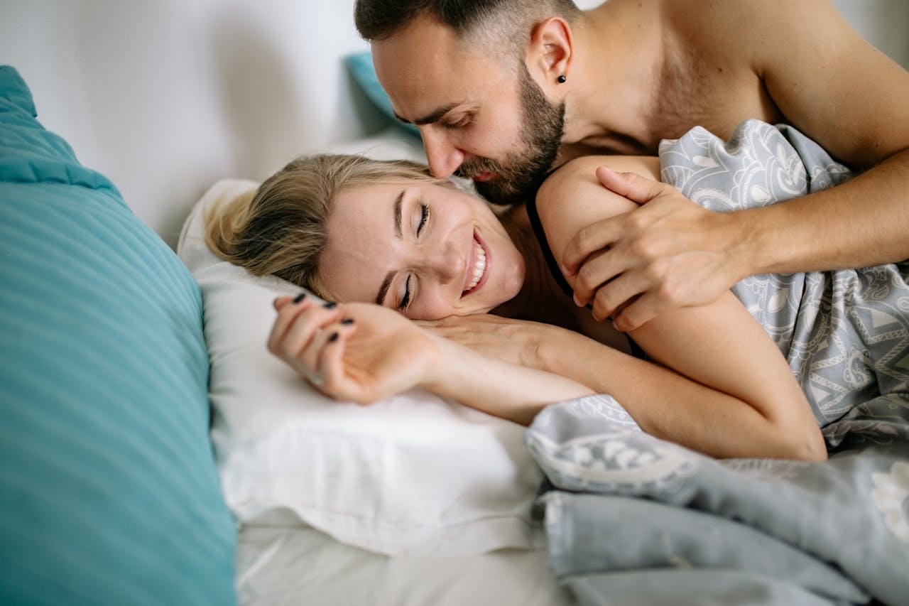 Man en vrouw in bed